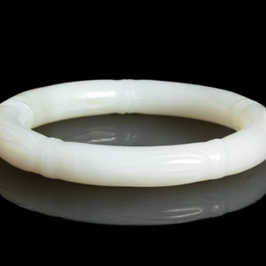 A Chinese White Jade 'Bamboo' Bangle
the