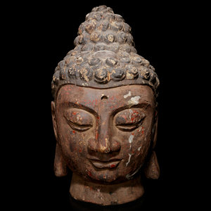 A Carved Wood Head of Buddha LIKELY 351dd5