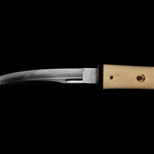 A Tanto
mounted in aikuchi style,