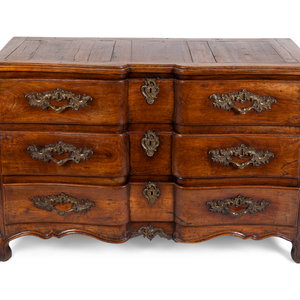 A Louis XV Provincial Walnut Commode
THIRD