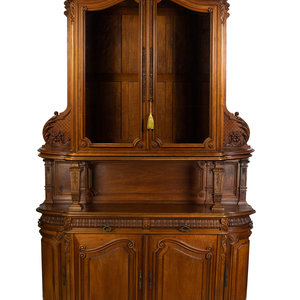 A Victorian Style Carved Walnut