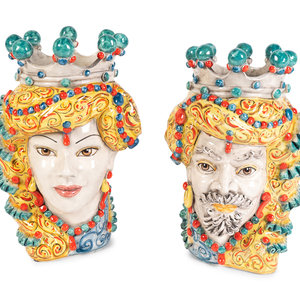 A Pair of Verus Maiolica Moor Head Vases
CALTAGIRONE,