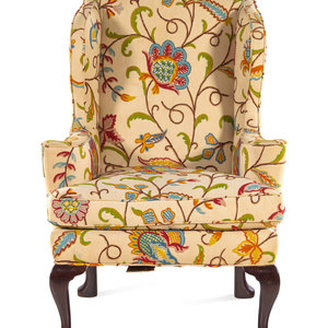 A Queen Anne Style Crewelwork Upholstered
