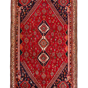 A Qashqai Wool Rug
Circa 1920
9 feet