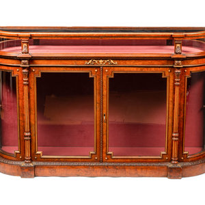 A Napoleon III Parcel Gilt Burlwood