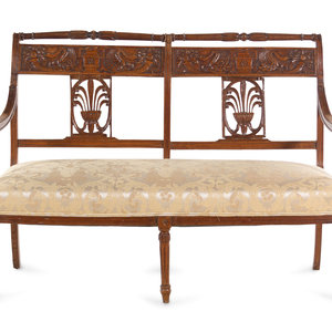 An Italian Carved Fruitwood Bench
With