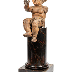 An Italian Carved Wood Figure of
