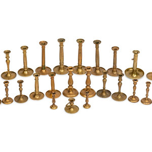 Twenty-Four English Brass Candlesticks
Late