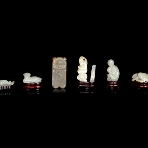 Seven Chinese Carved Jade Figures 352400