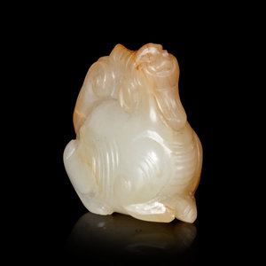 A Yellow Jade Figure of a Recumbent