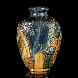 A Carved Tiger’s Eye Snuff Bottle
19TH