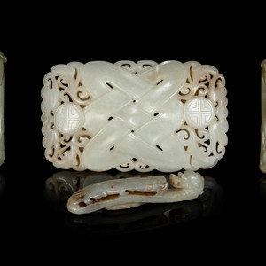 Four Chinese Jade Belt Ornaments
comprising