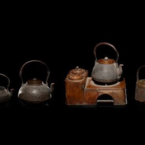 Four Japanese Cast Iron Teapots,