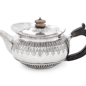 A George III Silver Teapot
Rebecca