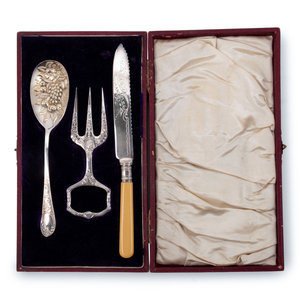 A Cased Silver-Plate Serving Set
comprising
