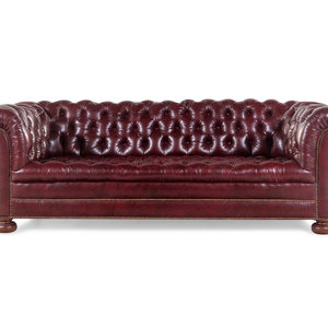 A Tufted Faux Leather Upholstered Chesterfield