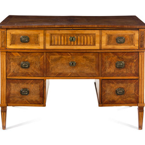 A Louis XVI Walnut and Fruitwood