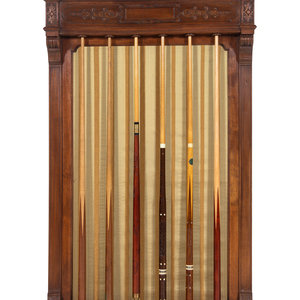 A Carved Walnut Billiards Cue Rack 352702