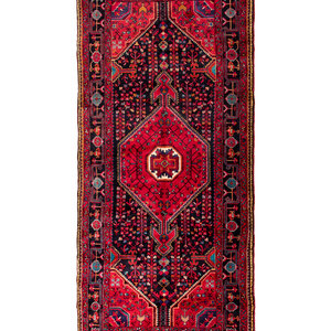 A Persian Malayer Wool Rug
Circa