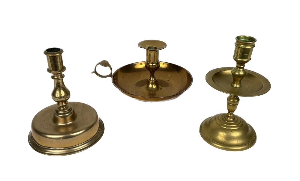 THREE BRASS CANDLE HOLDERS HEIGHTS