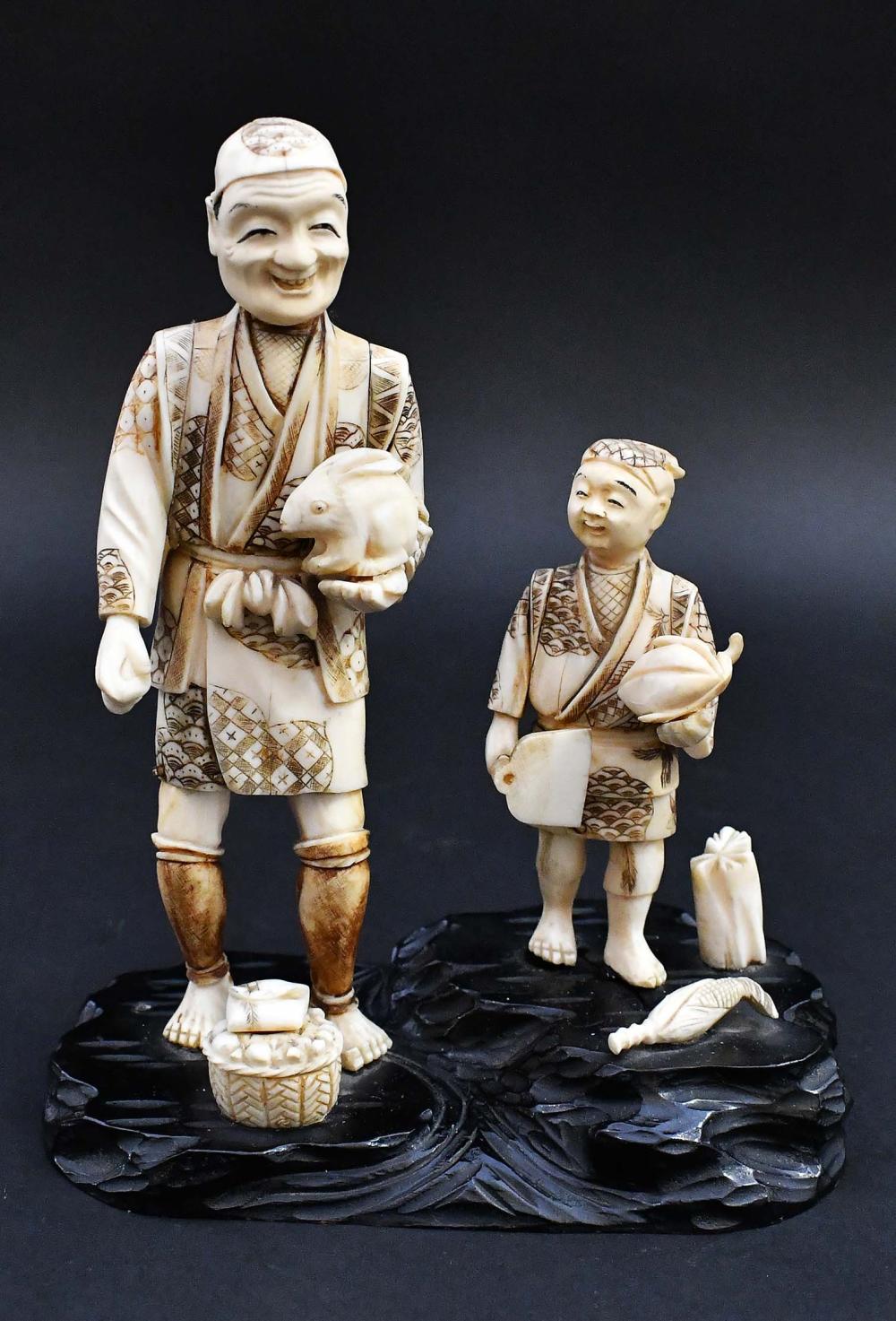 JAPANESE CARVED OKIMONO OF A FARMER