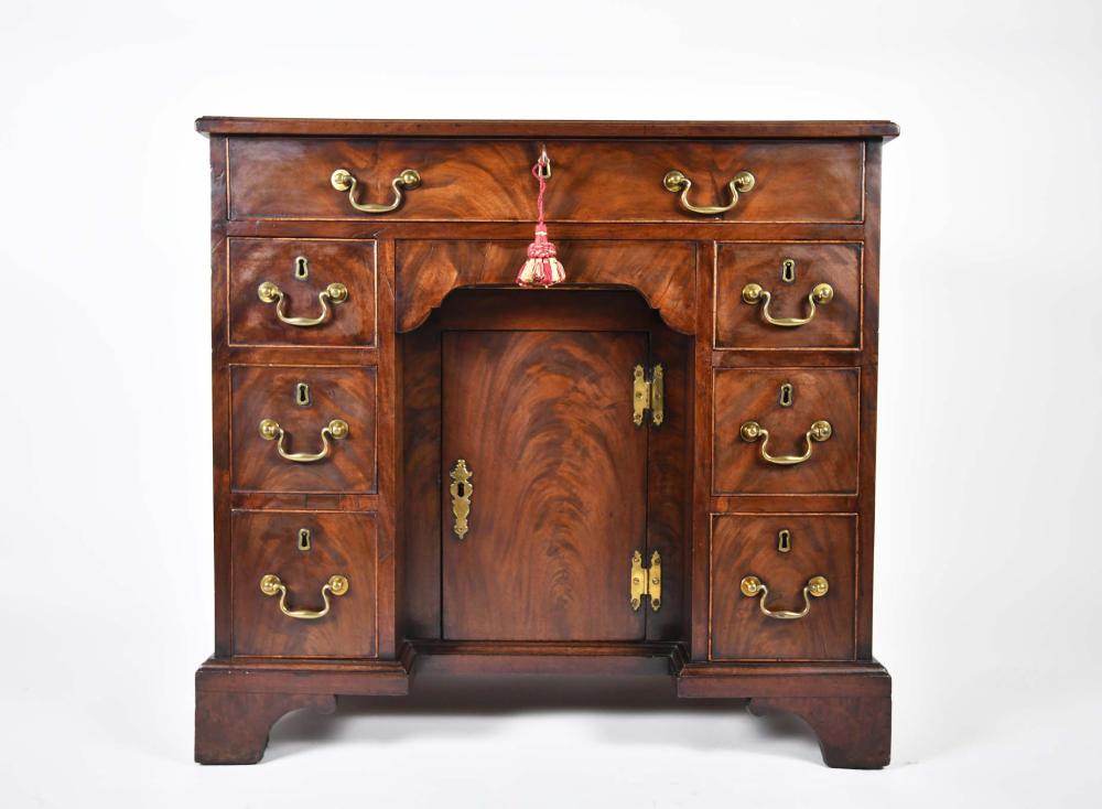 GEORGE III MAHOGANY KNEE-HOLE DESKCirca