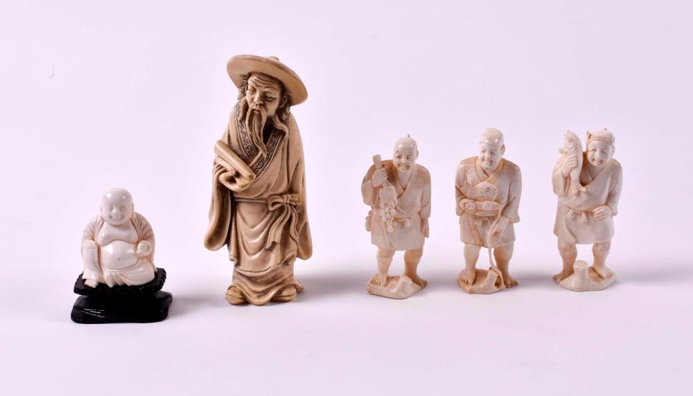 FOUR ASIAN CARVED FIGURESComprising 3543b5