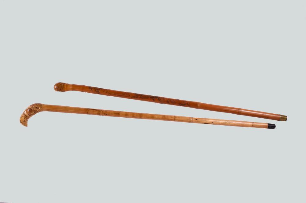 TWO JAPANESE BAMBOO WALKING STICKSFirst