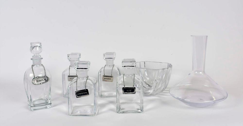 SIX COLORLESS GLASS DECANTERS &