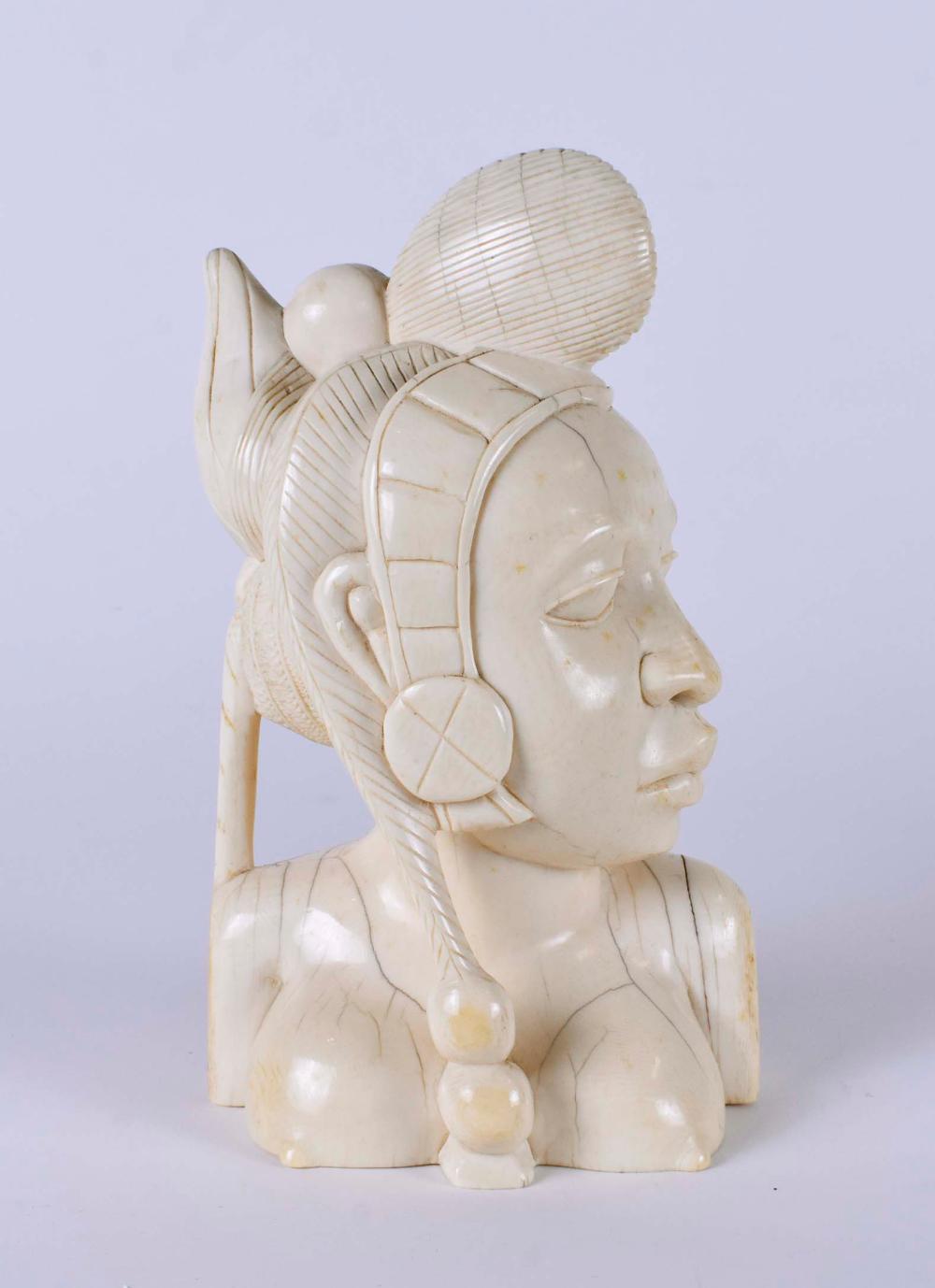 AFRICAN CARVED HEAD OF A PRINCESSHer