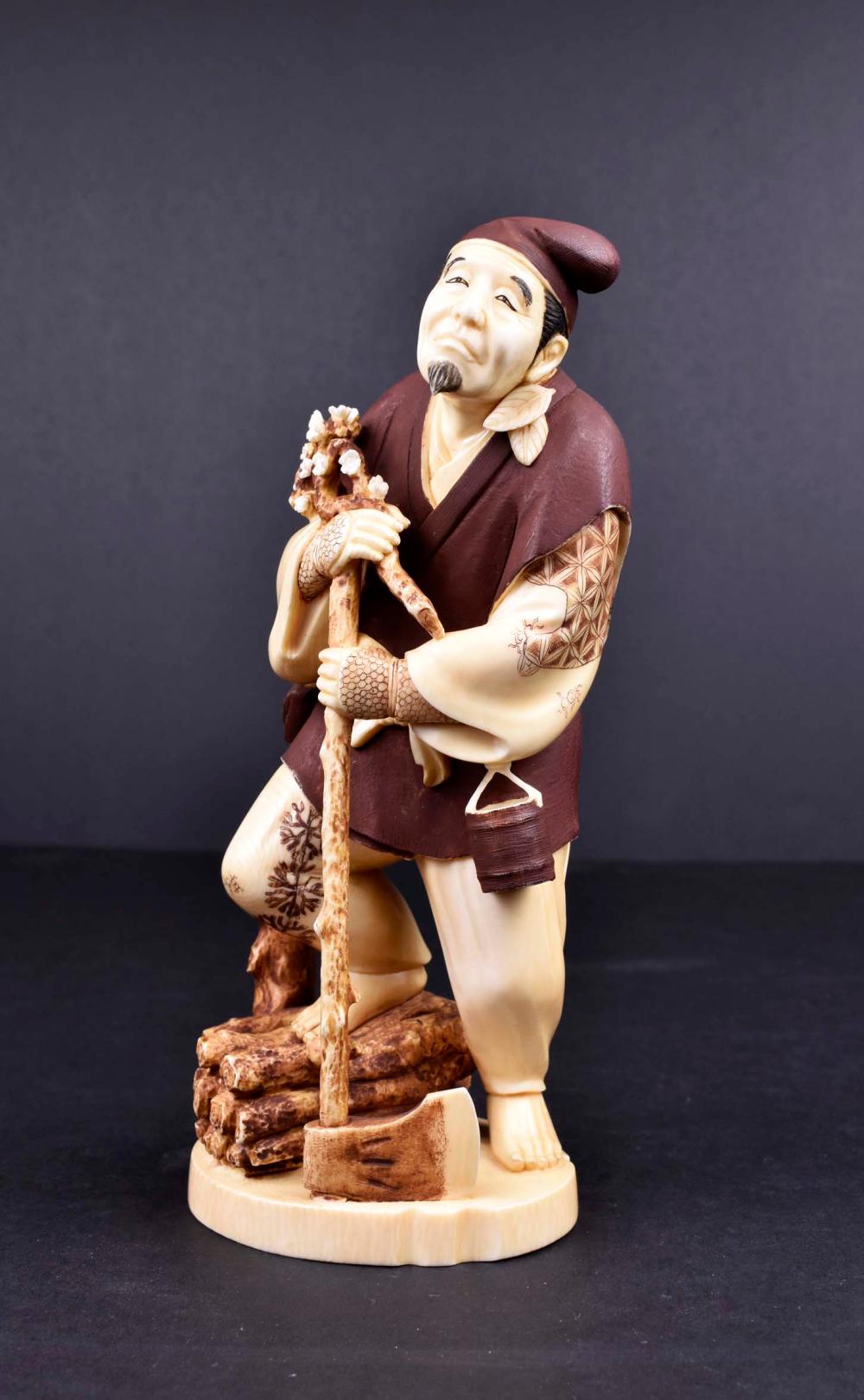 JAPANESE OKIMONO OF A WOOD CHOPPERMeiji