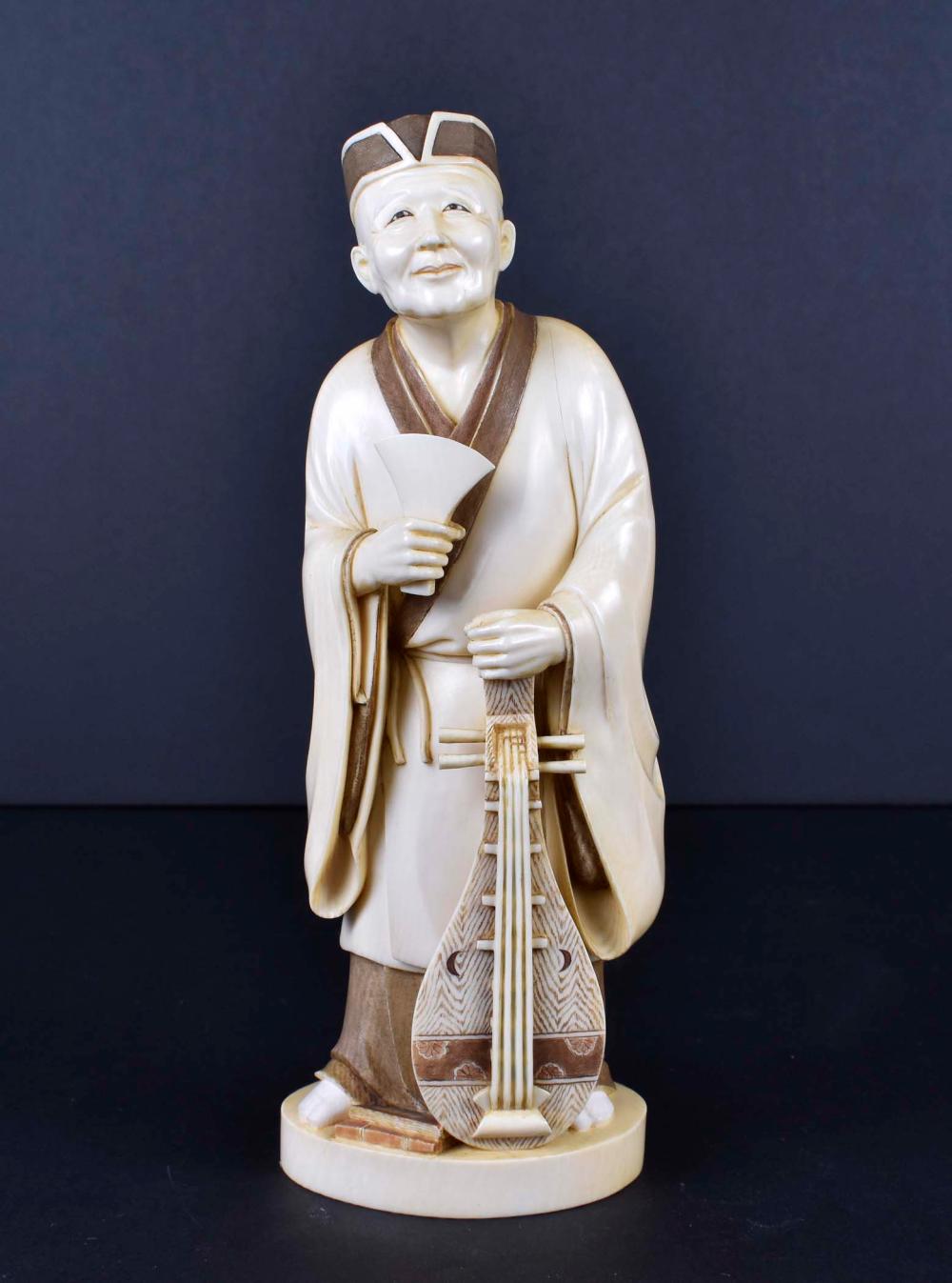 JAPANESE OKIMONO OF A MUSICIANMeiji