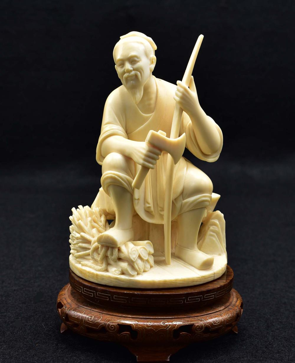 CHINESE CARVING OF AN ELDERLY WOOD CHOPPERThe