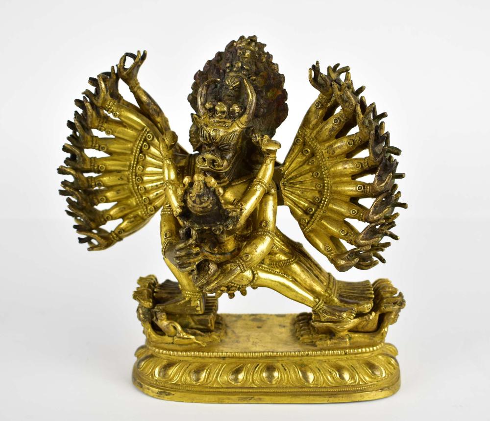 SINO TIBETAN GILT BRONZE MULTI ARMED 354735