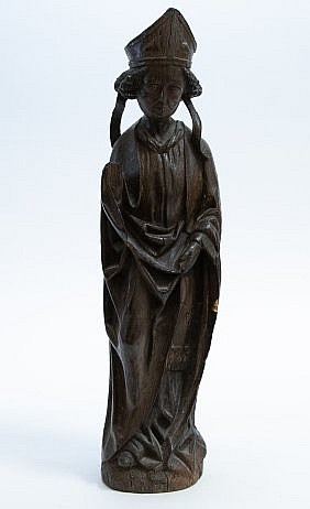 CONTINENTAL CARVED OAK FIGURE OF