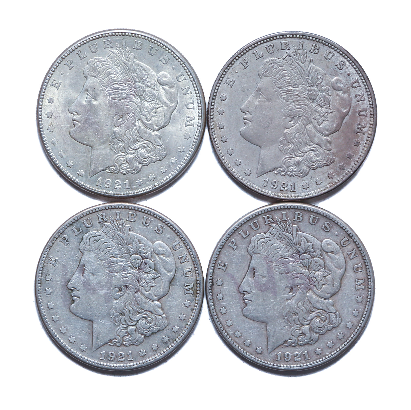 FOUR 1921 MORGAN DOLLARS Grades