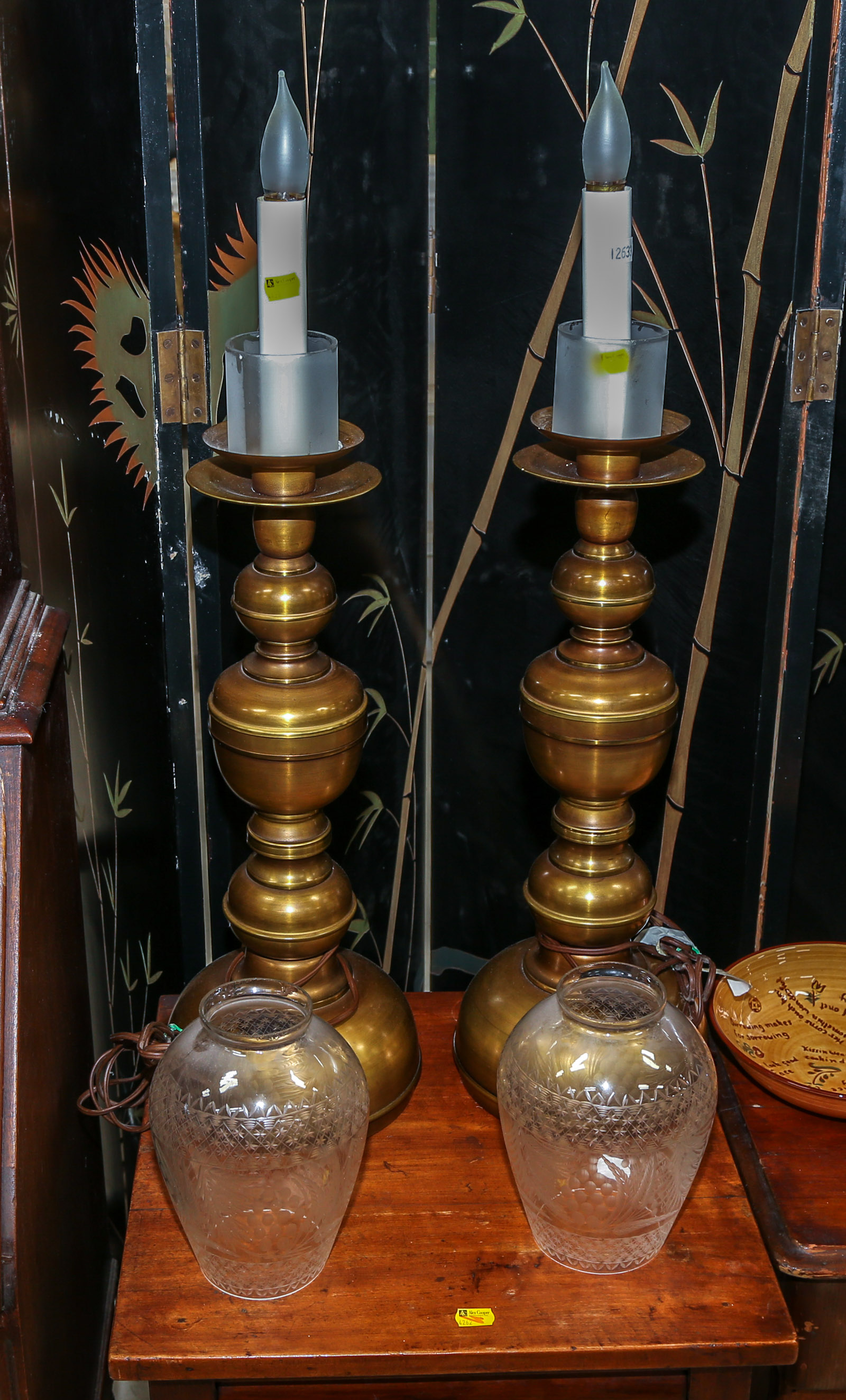 A PAIR OF BRASS TABLE LAMPS With etched