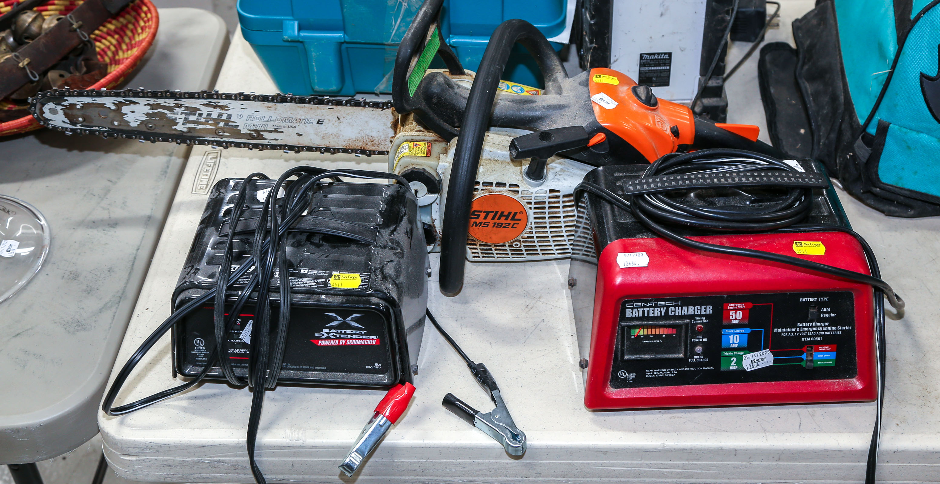 TWO BATTERY CHARGERS With a Stihl MS192C