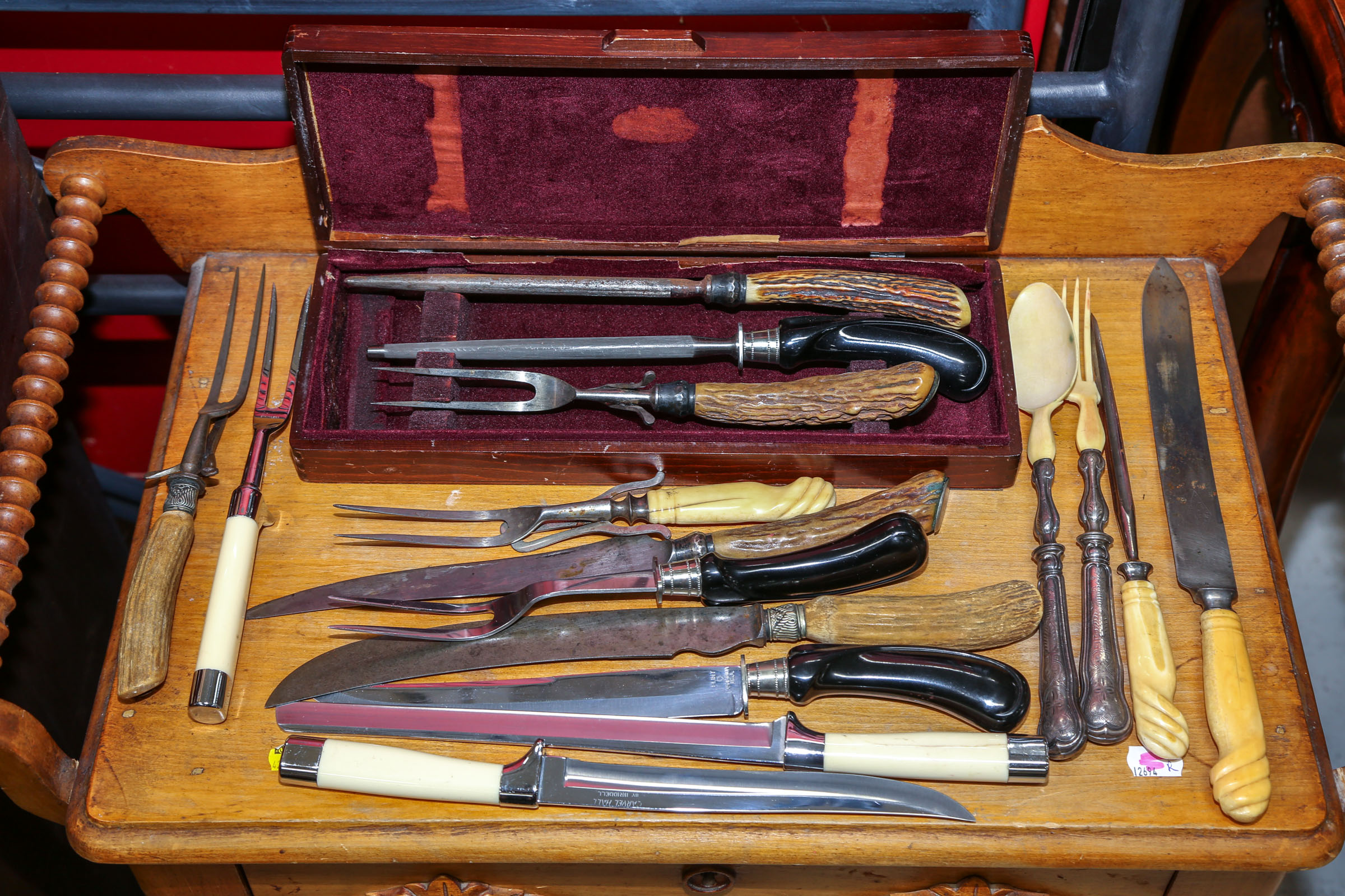 FIVE ASSORTED CARVING SETS With a pair