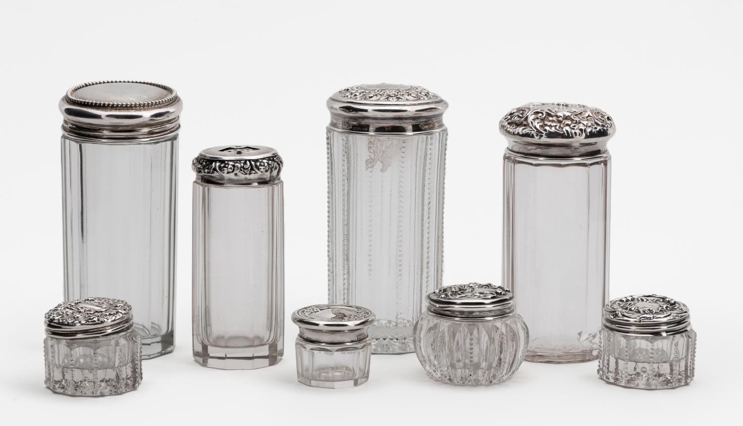 EIGHT AMERICAN STERLING GLASS LIDDED