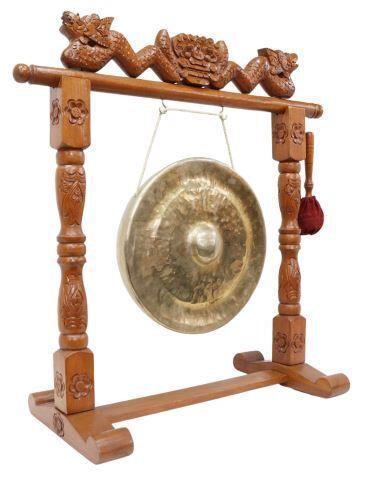 BRASS GONG & MALLET ON CARVED WOOD