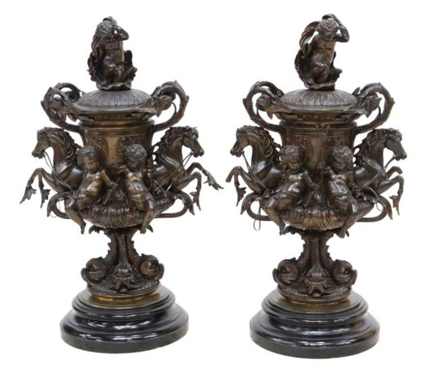 (2) BRONZE LIDDED URNS WITH PUTTI