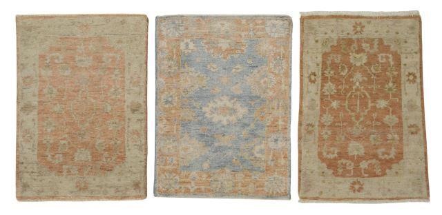 (3) HAND-TIED OUSHAK RUGS, 2'10.5"