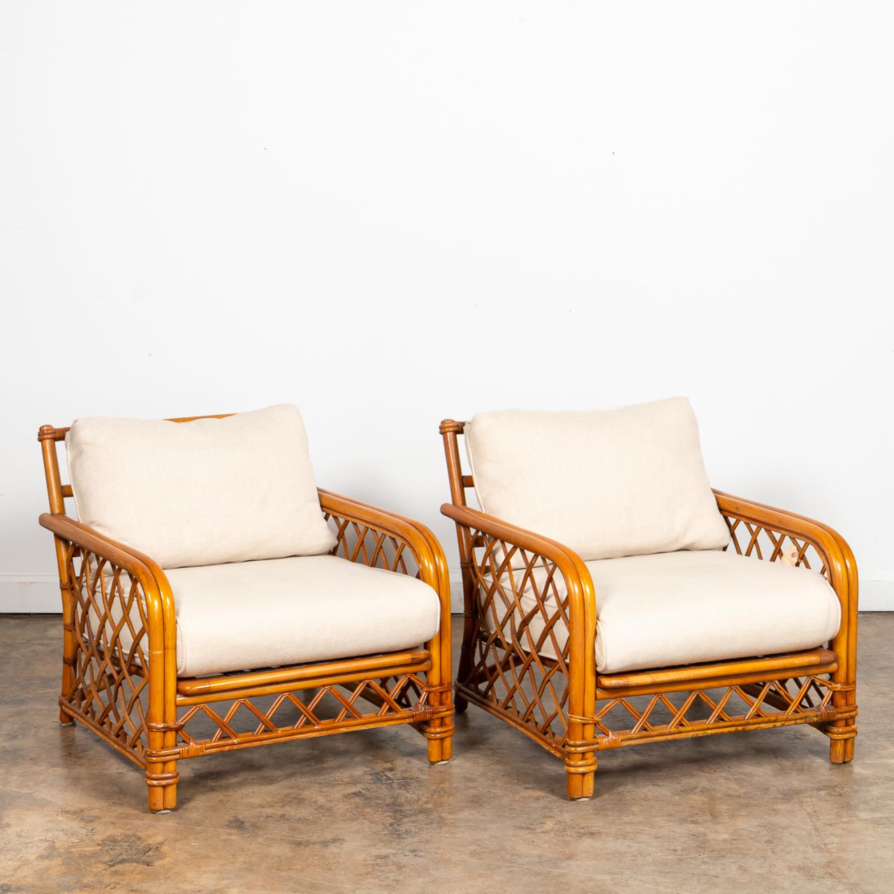 PAIR FICKS REED RATTAN ARMCHAIRS 35ac28