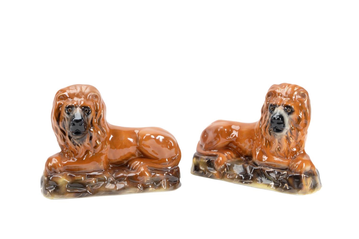 PAIR OF STAFFORDSHIRE LIONS W  3591a6