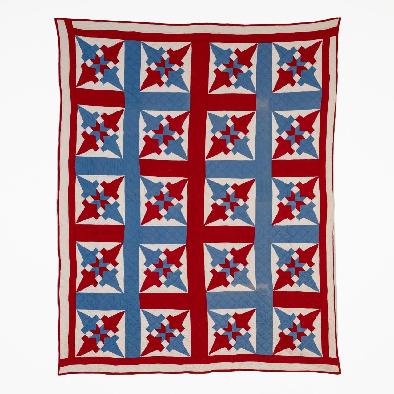 HAND QUILTED COTTON FOUR POINT STAR