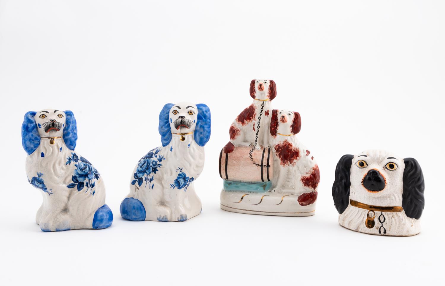 GROUP 4 STAFFORDSHIRE POTTERY DOG