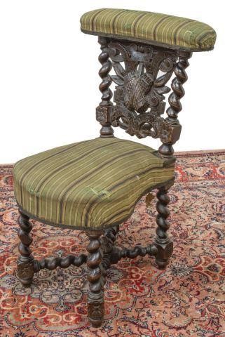 FRENCH CARVED OAK CIGAR CHAIRFrench