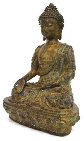 PATINATED BRONZE SEATED VARADA