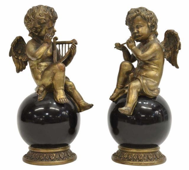 (2) BRONZE SEATED WINGED CHERUB